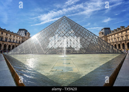 Louvre pyramid in the main courtyard of the Louvre Palace, Paris France Stock Photo