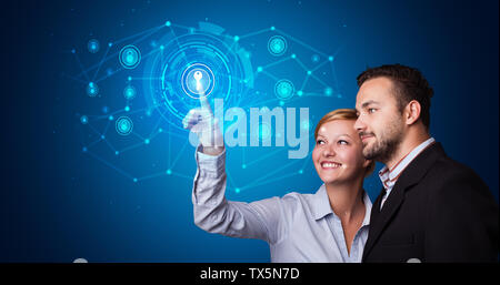 Man touching hologram screen displaying keys and locks Stock Photo