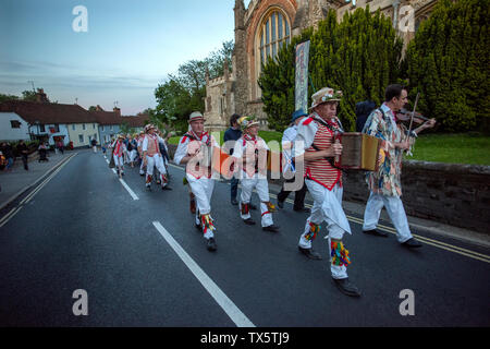 Thaxted Morris Men at the Thaxted Patronal Festival, Thaxted Essex, England. 22 6 2019 Thaxted Morris Men perform outside Thaxted Church Stock Photo