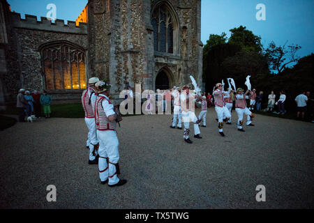 Thaxted Morris Men at the Thaxted Patronal Festival, Thaxted Essex, England. 22 6 2019 Thaxted Morris Men perform outside Thaxted Church Stock Photo