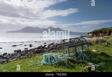 A lobster pot on the shore at Laig bay, Isle of Eigg, Small Isles, Scotland. Stock Photo