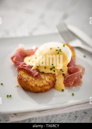 eggs Benedict hash browns Stock Photo