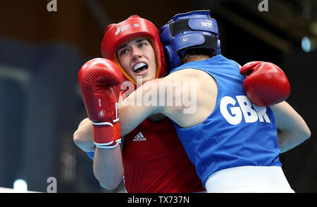 Ireland's Grainne Walsh (left) on her way to winning against Great Britain's Rosie Eccles in the Women's Welterweight Boxing at sport Palace Uruchie, during day four of the European Games 2019 in Minsk. Stock Photo