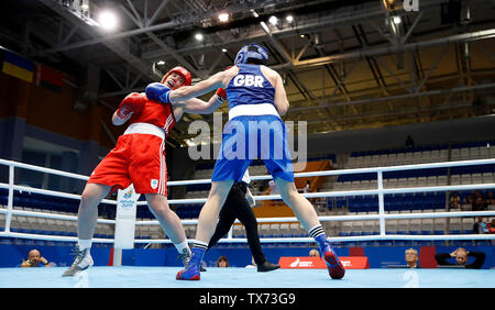 Ireland's Grainne Walsh (left) on her way to winning against Great Britain's Rosie Eccles in the Women's Welterweight Boxing at Sport Palace Uruchie, during day four of the European Games 2019 in Minsk. Stock Photo