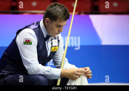 Ryan Day of Wales considers a shot to India in the Group D match during the Beverly 2019 Snooker World Cup in Wuxi city, east China's Jiangsu province, 24 June 2019. Wales defeated India 4-0. Stock Photo