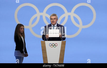 Lausanne, Switzerland. 24th June, 2019. President of the International Olympic Committee (IOC) Thomas Bach announces Milan-Cortina d'Ampezzo of Italy to host the 2026 Olympic Winter Games during the 134th session of International Olympic Committee (IOC) in Lausanne, Switzerland, June 24, 2019. Credit: Cao Can/Xinhua/Alamy Live News Stock Photo