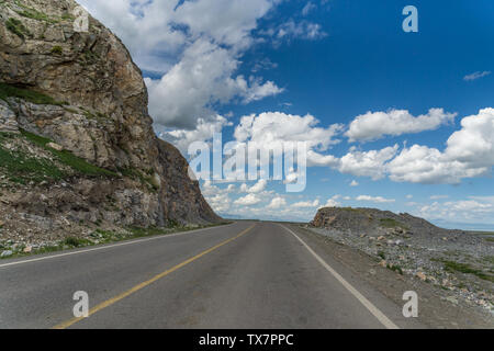 Summer Xinjiang Gobi highway car background Stock Photo