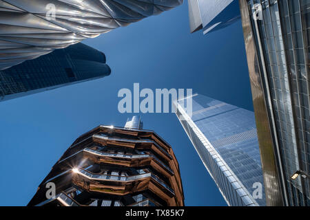 Looking up at The Vessel and The Shed, Hudson Yards, Manhattan, New York City, New York, USA Designed by the British designer Thomas Heatherwick Stock Photo