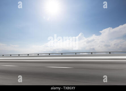 Empty road with blue cloudsky Stock Photo