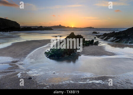 Sunset Lusty Glaze Beach in Cornwall. Stock Photo