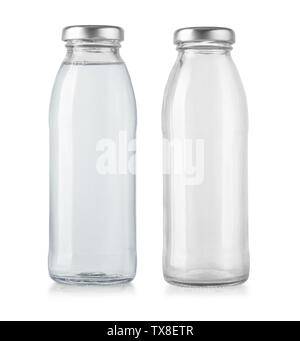 glass water bottle and empty bottle isolated on white Stock Photo