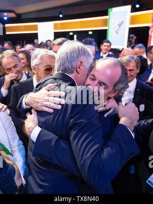 Lausanne, Switzerland. 24th June, 2019. Members of the Milan-Cortina delegation celebrate after the cities won the bid to host the 2026 Winter Olympic Games during the 134th session of the International Olympic Committee (IOC) in Lausanne, Switzerland, on June 24, 2019. Credit: POOL/Xu Jinquan/Xinhua/Alamy Live News Stock Photo