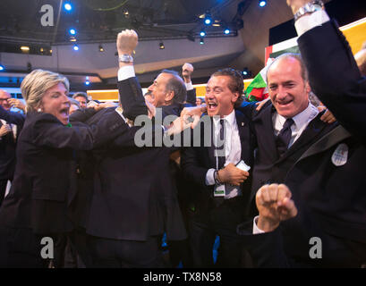 Lausanne, Switzerland. 24th June, 2019. Members of the Milan-Cortina delegation celebrate after the cities won the bid to host the 2026 Winter Olympic Games during the 134th session of the International Olympic Committee (IOC) in Lausanne, Switzerland, on June 24, 2019. Credit: POOL/Xu Jinquan/Xinhua/Alamy Live News Stock Photo