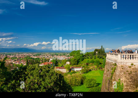 Tourists watching the city of Vicenza from Mount Berico panoramic terrace Stock Photo
