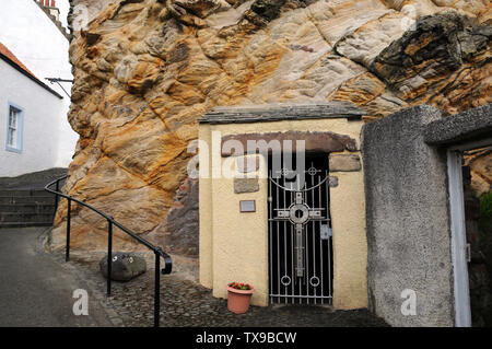 Entrance to St Fillan's Cave in the village of Pittenweem, Fife. Stock Photo