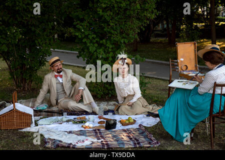 Reconstruction of noble picnic of the late 19th and early 20th century on Strastnoy Boulevard during the festival 'Moscow - Paris' in Moscow, Russia Stock Photo