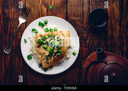 Japanese dish. Rice with scrambled eggs, chicken and green onion Stock Photo