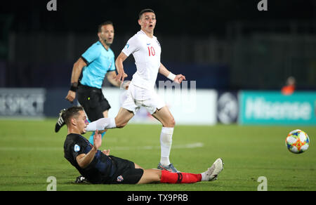 England's Phil Foden (top) and Croatia's Nikola Katic battle for the ball during the 2019 UEFA European Under-21 Championship match at The San Marino Stadium, Serravalle. Stock Photo