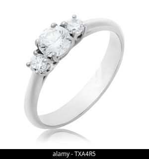 White gold engagement ring with three diamonds isolated on a white background. The photo was taken using the stacking method Stock Photo