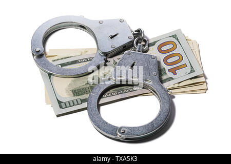 Handcuffs on dollars isolated on white background. Concept on the topic of fraud with foreign exchange transactions Stock Photo
