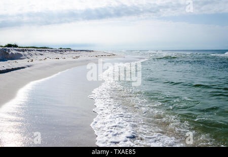 Tropical Gulf Coast ocean beach landscape scene. Beautiful scenic tourist travel destination location. Relaxing Gulf Coast seaside beaches. Stock Photo