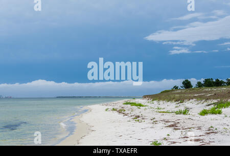 Tropical Gulf Coast ocean beach landscape scene. Beautiful scenic tourist travel destination location. Relaxing Gulf Coast seaside beaches. Stock Photo