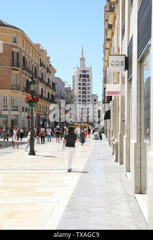 The expensive designer shopping and pedestrian street of Calle Marques de Larios, in the centre of Malaga city, Spain, Europe Stock Photo