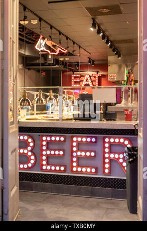 New Orleans, Louisiana - A fast food restaurant on Bourbon Street. Stock Photo