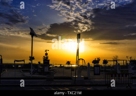 Park with Sunrise in the waterfront in Palermo, Sicily, Italy Stock Photo