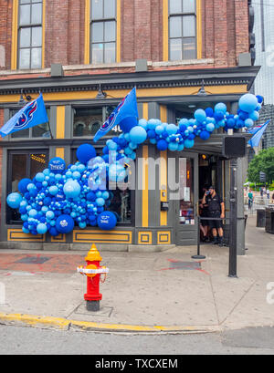 Dierks Bentley's Whiskey Row restaurant and bar on Broadway adorned with blue balloons during NFL Draft 2019 Nashville Tennessee. Stock Photo