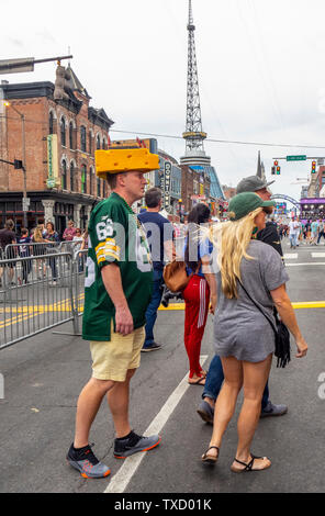 Cheesehead fans of the Green Bay Packers football team come out in droves  with their head gear and bratwursts to support the team in Green Bay,  Wisconsin - digital file from original