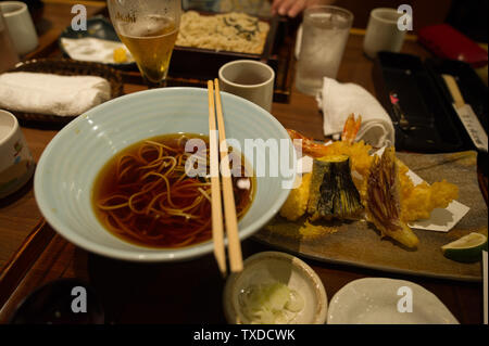 An evening meal in Tokyo, Japan. Stock Photo