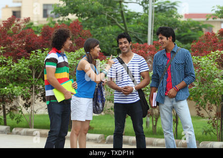 College students talking at the campus Stock Photo