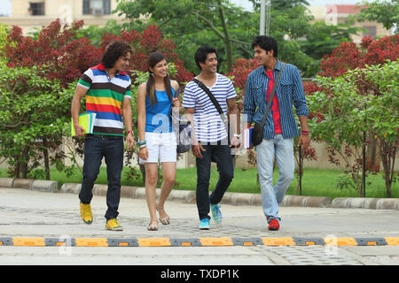 College students walking at the campus Stock Photo