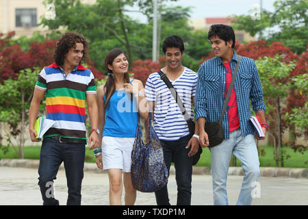 College students walking at the campus Stock Photo