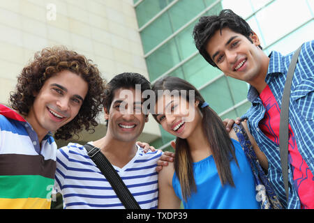 College students smiling at the campus Stock Photo