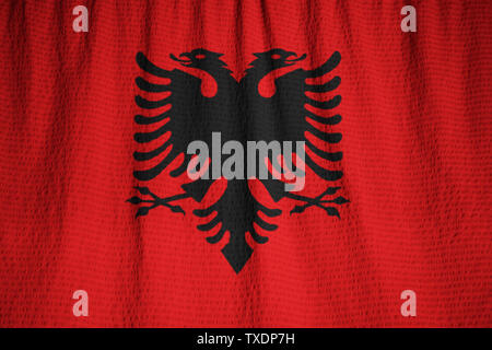 Ruffled Flag of Albania Blowing in Wind Stock Photo