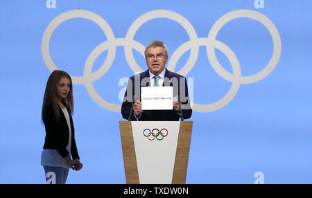Beijing, Switzerland. 24th June, 2019. President of the International Olympic Committee (IOC) Thomas Bach announces Milan-Cortina d'Ampezzo of Italy to host the 2026 Olympic Winter Games during the 134th IOC session in Lausanne, Switzerland, June 24, 2019. Credit: Cao Can/Xinhua/Alamy Live News Stock Photo