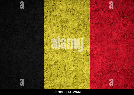 Belgium flag painted on the cracked grunge concrete wall Stock Photo