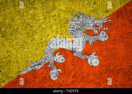 flag of Bhutan painted on cracked wall Stock Photo - Alamy