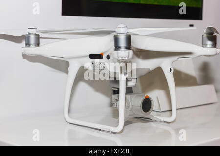 Quadcopter for flying on the radio. Drone for shooting photos and video from a height of flight. Stock Photo