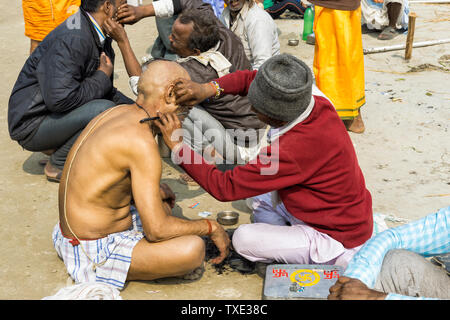 Outside barbershop during the Allahabad Kumbh Mela, World’s largest religious gathering, Uttar Pradesh, India Stock Photo