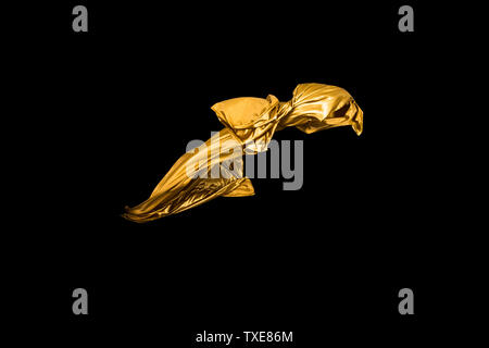 golden soft satin flying in wind on background Stock Photo