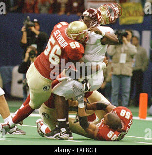 Virginia Tech quarterback Michael Vick, shown in this Aug. 5, 1999  preseason photo in Blacksburg, Va., led the Hokies as a red shirt freshman  to a perfect 11-0 regular season. Virginia Tech