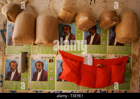 Posters of Afghanistan presidential candidate Gholam Sadigh Baghermoradi hang on the wall in a shop in Herat, Afghanistan on August 12, 2009. Afghanistan's presidential election will be held on August 20.    UPI/Mohammad Kheirkhah Stock Photo