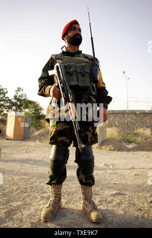 An Afghan National Army (ANA) soldier stands guard at a security checkpoint on the eve of election day in Kabul, Afghanistan on August 19, 2009. UPI/Mohammad Kheirkhah. Stock Photo