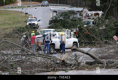 https://l450v.alamy.com/450v/txeae3/workers-clear-debris-from-the-street-at-lillian-c-poole-elementary-school-in-paulding-county-after-an-apparent-tornado-touch-down-in-rockmart-georgia-that-damaged-the-school-homes-and-the-countys-airport-about-45-miles-northwest-of-atlanta-on-march-3-2012-the-national-weather-service-said-the-destructive-storms-were-the-second-outbreak-of-severe-storms-in-just-three-days-across-much-of-the-central-us-upidavid-tulis-txeae3.jpg