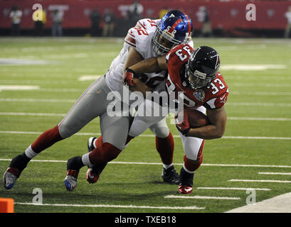 Oct 16, 2011; East Rutherford, NJ, USA; New York Giants linebacker Spencer  Paysinger (55) leaves the field after the game against the Buffalo Bills at  MetLife Stadium. New York defeated Buffalo 27-24 Stock Photo - Alamy