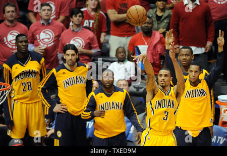 Indiana Pacers guard George Hill (3) shoots a 3-point basket against the Atlanta Hawks during the second half of Game 6 in their Eastern Conference NBA playoff series at Philips Arena in Atlanta, May 1, 2014. Indiana won 95-88. UPI/David Tulis Stock Photo