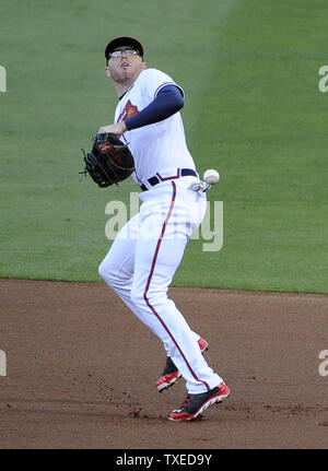 Atlanta Braves first baseman Matt Olson catches a throw to get ...